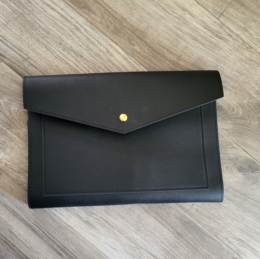 Glass ladder & company black vegan pebble leather . Megan Portfolio